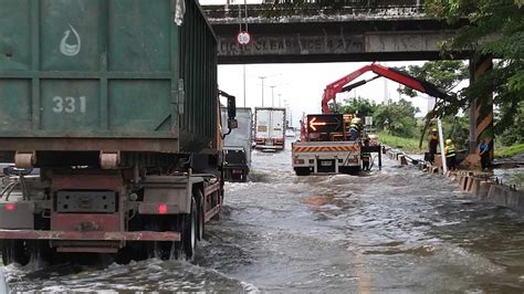 Typhoon Carina flood update: Parts of NLEX unpassable.